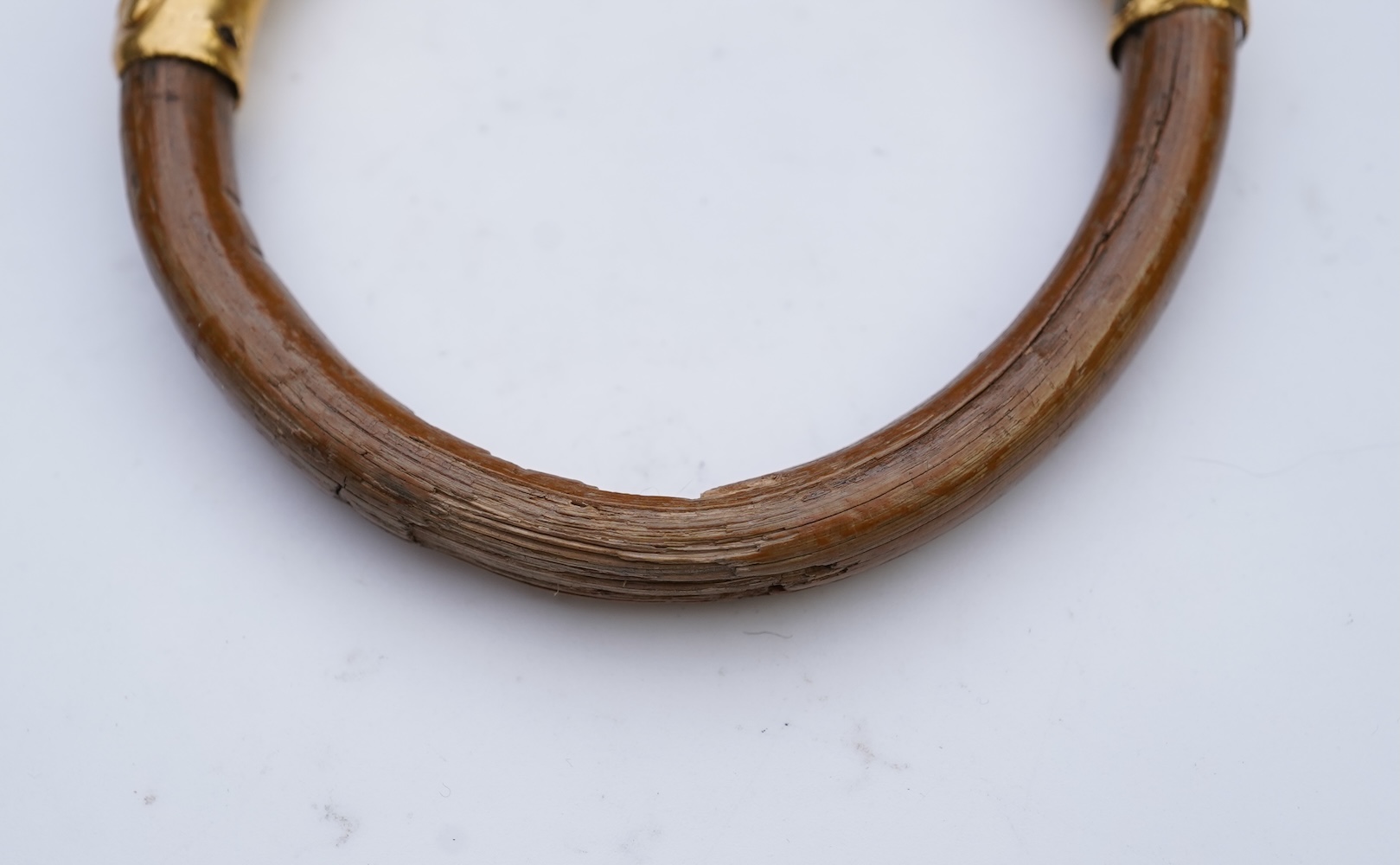 A gold and wood bangle, China, late 19th/early 20th century